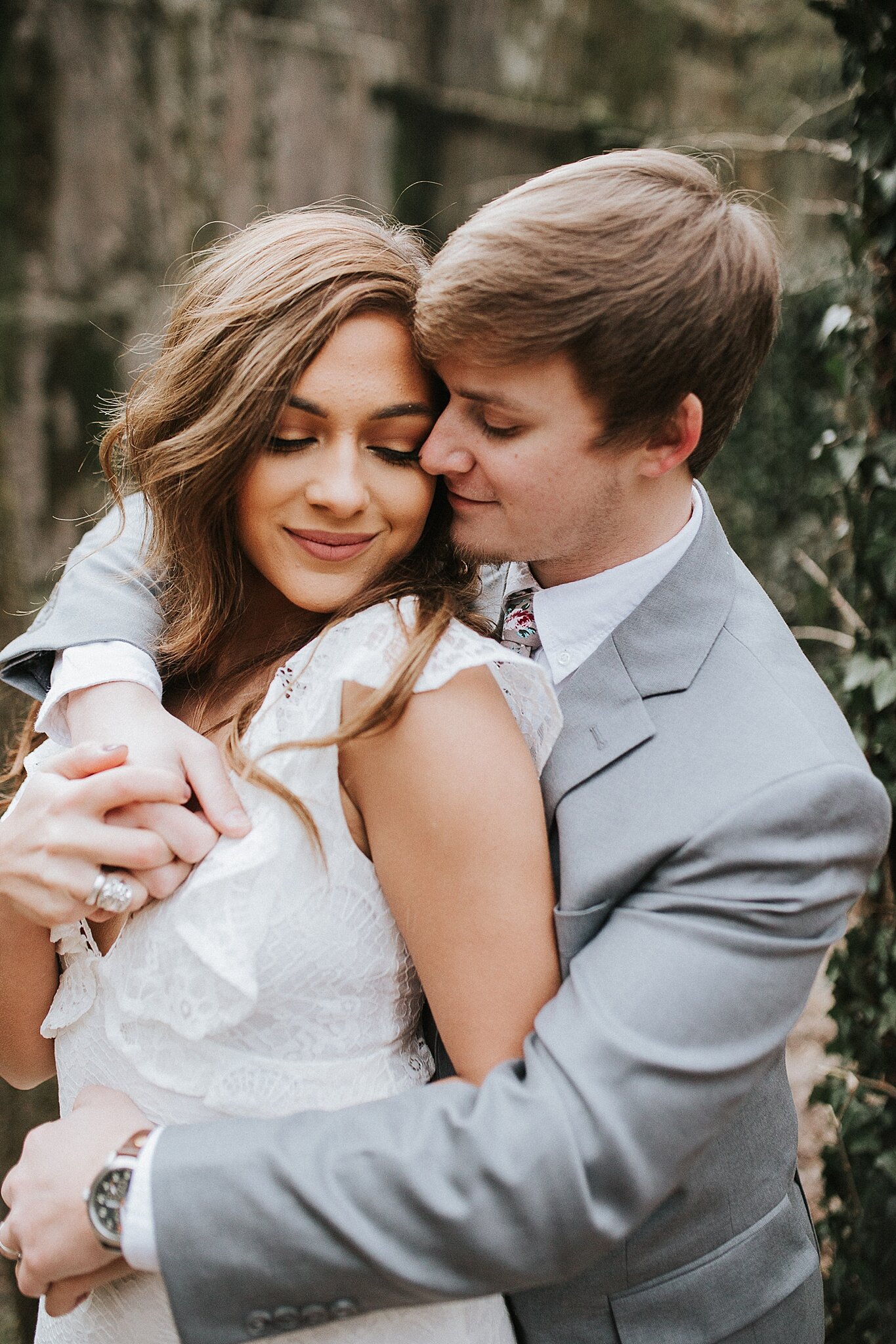 Knoxville elopement in the Ijams with bride bring embraced by her groom
