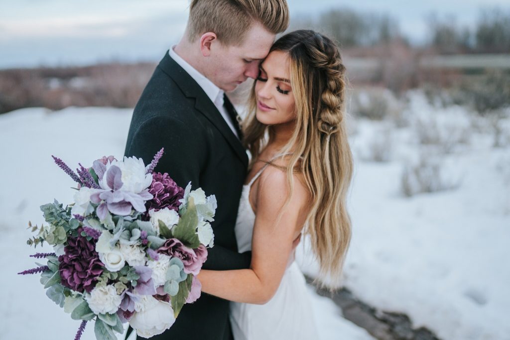 Bride and groom embracing during wintertime bridal session in nashville