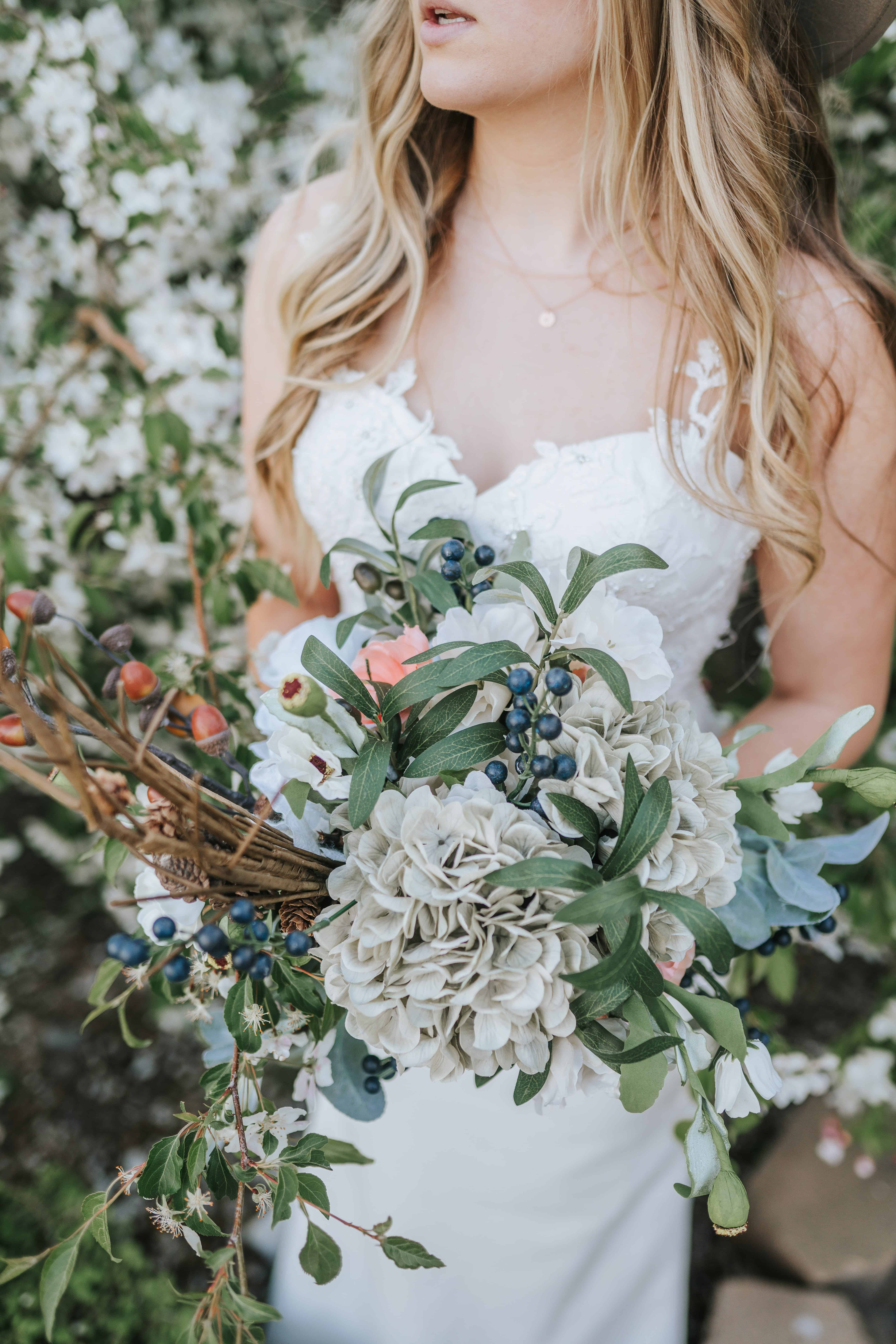 up close view of bride holding her floral arrnagement