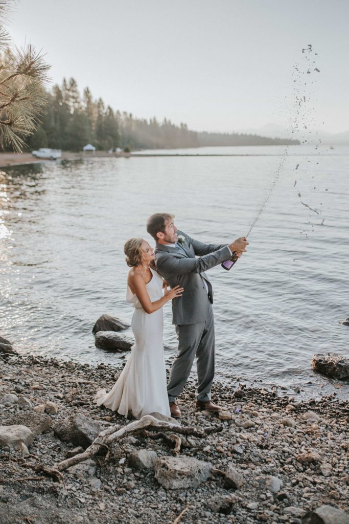 bride and groom celebrating micro wedding at lake tahoe