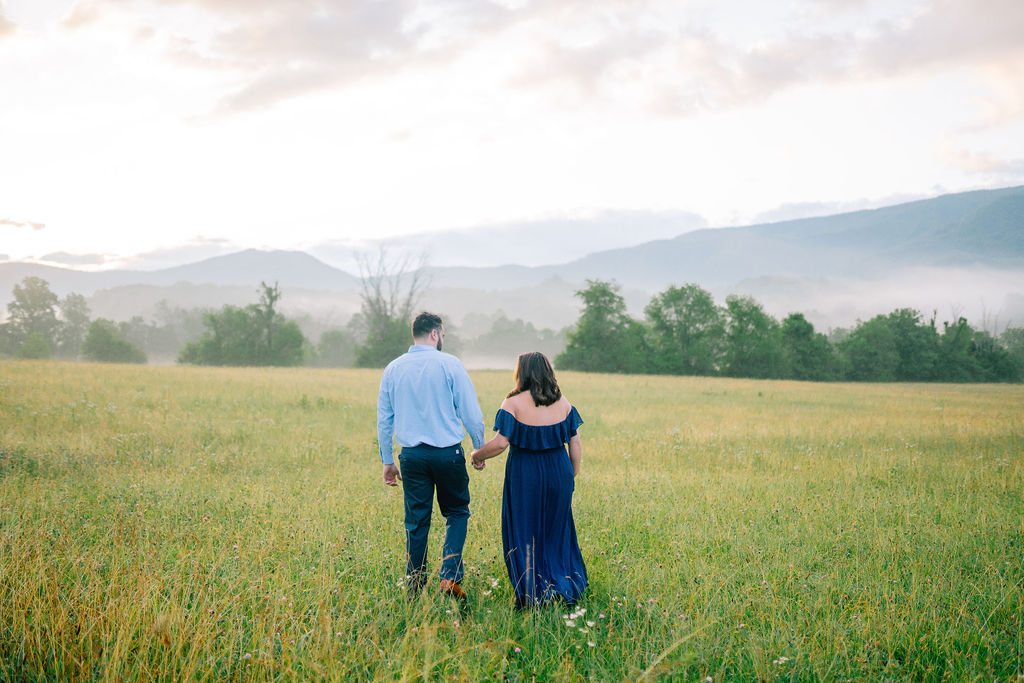 Gatlinburg TN engagement session in the smoky mountains couple walking hand in hand