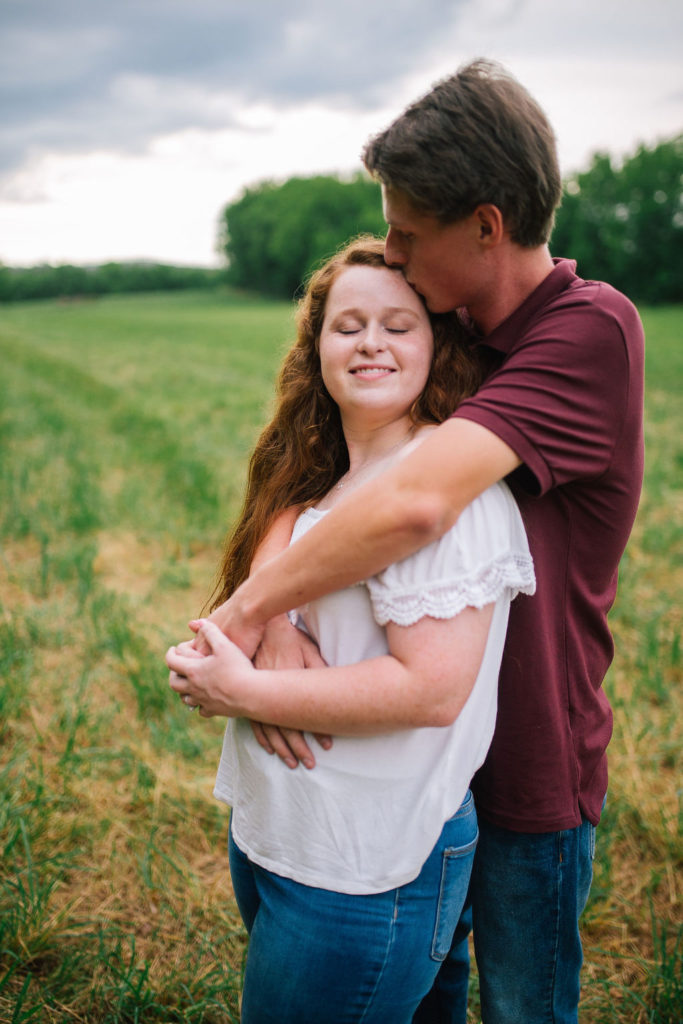 Knoxville engagement session butler's farm couple with beautiful red hair