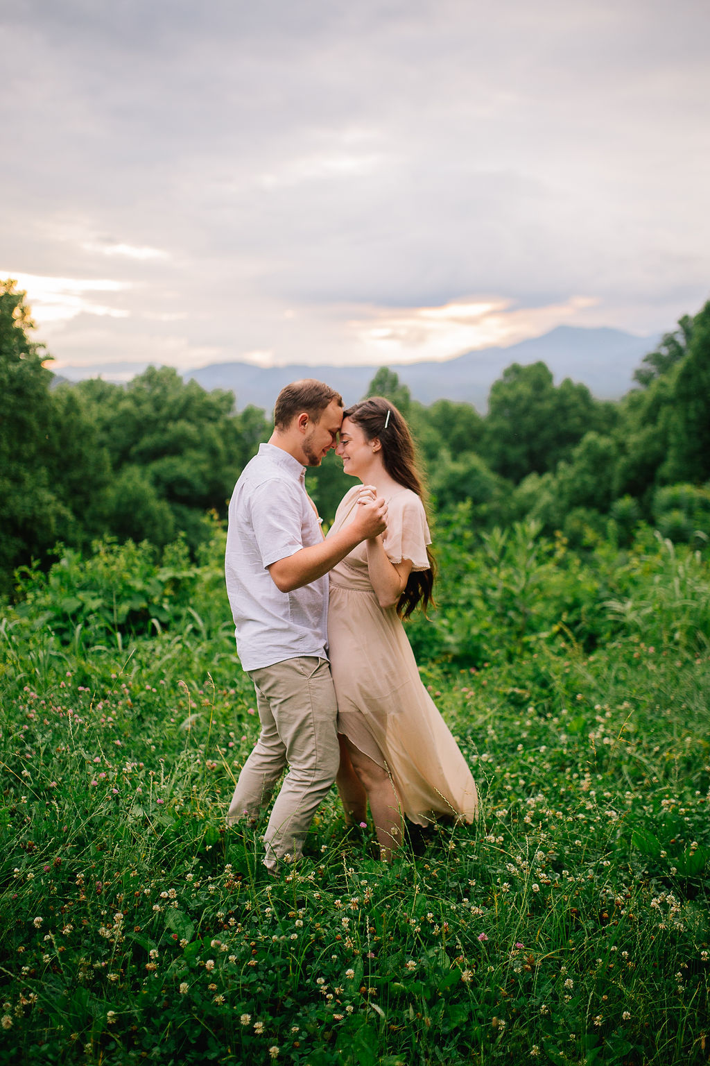 bride and groom dancing together in the Smokies