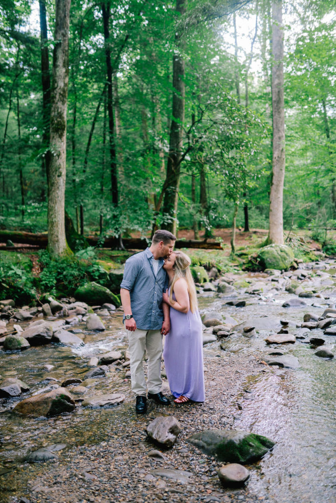 Cade's Cove engagement session kissing in the water