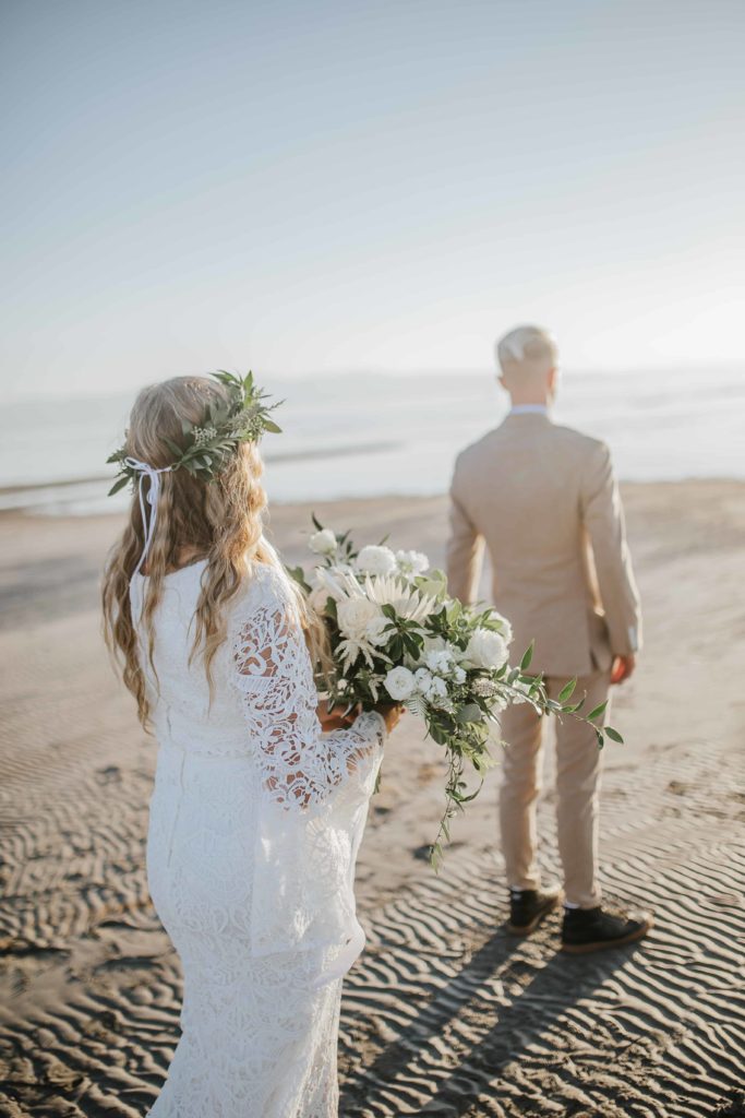 bride and groom first look session on beaches of outer banks