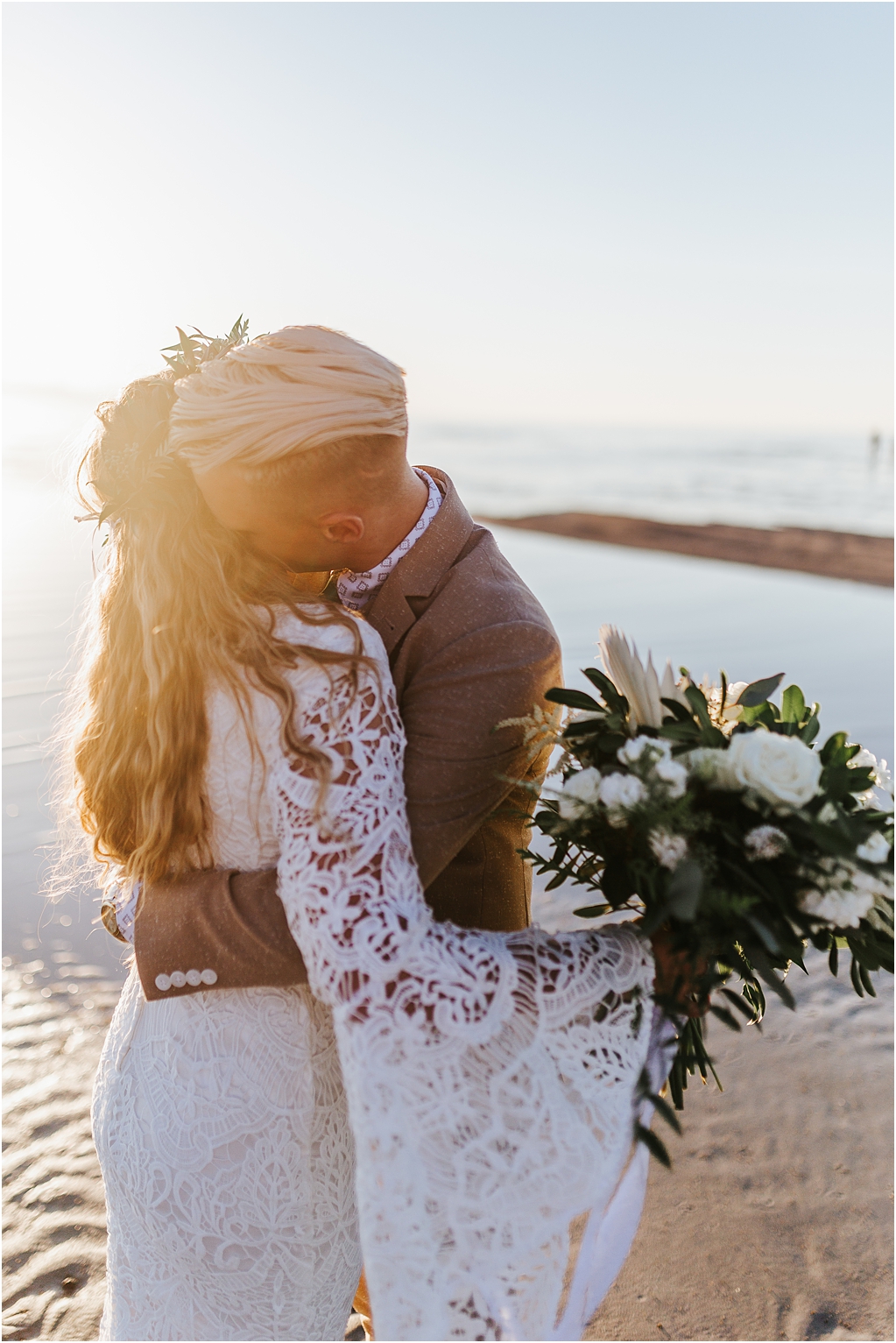 Outer Banks beach front elopement first look bridal session look for the light photo video sunflare