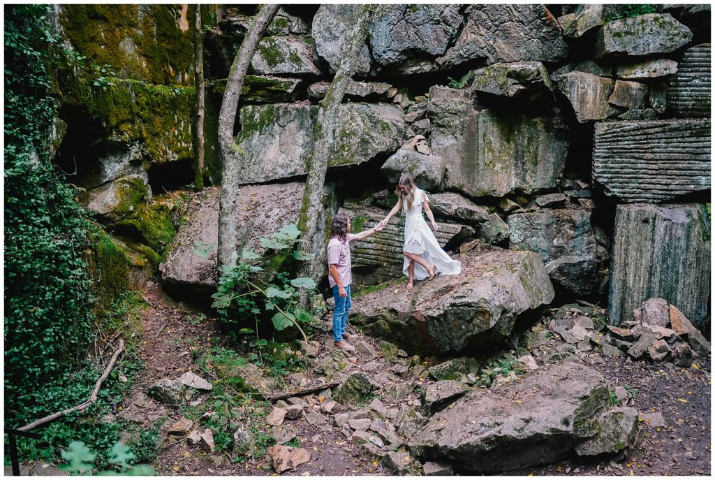 couple engagement session outside of meads quarry stone