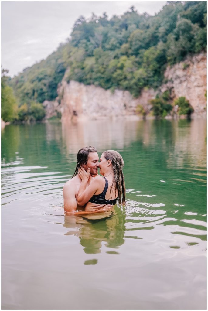 couple in water of meads quarry in ijams nature park