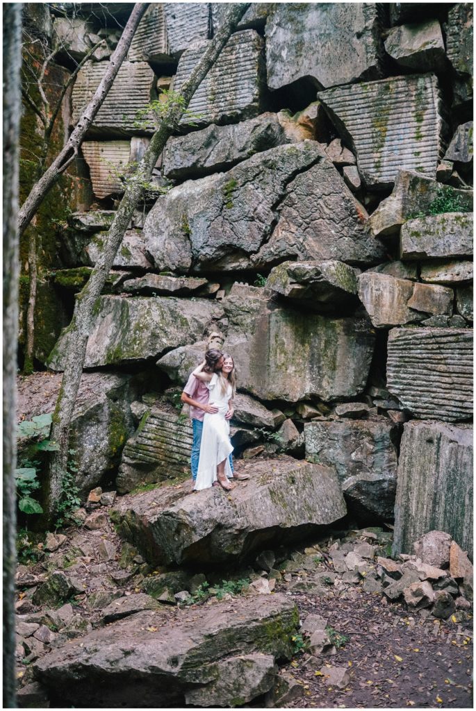 couple posing during engagement session in ijam meads quarry