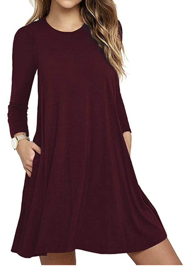 woman wearing burgundy swing dress