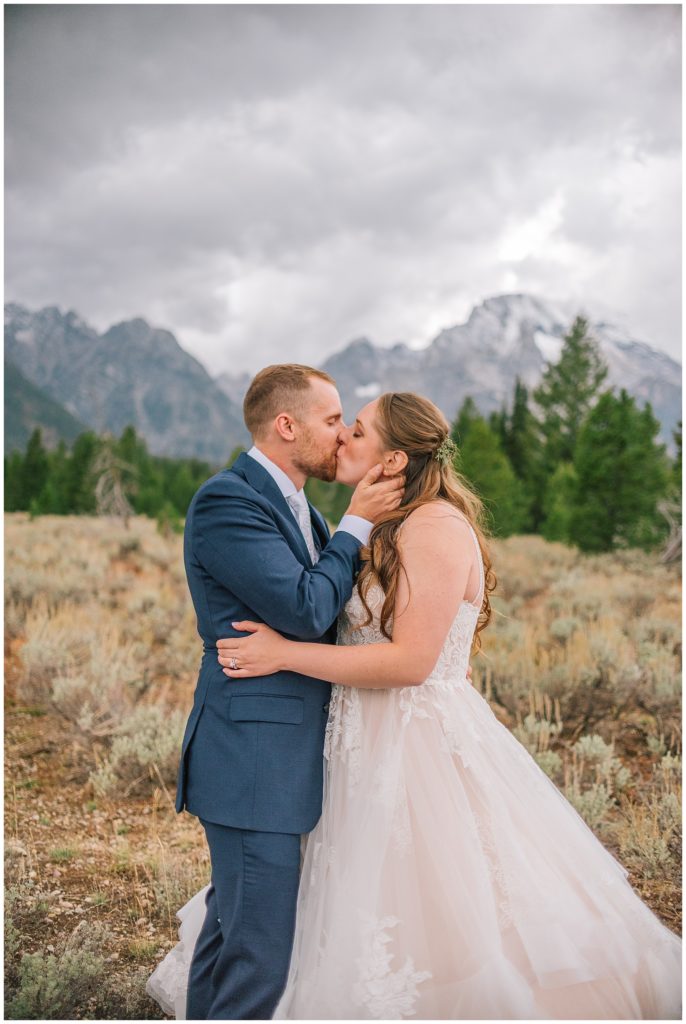 Bride and groom kissing after Smoky Mountain adventure elopement wedding