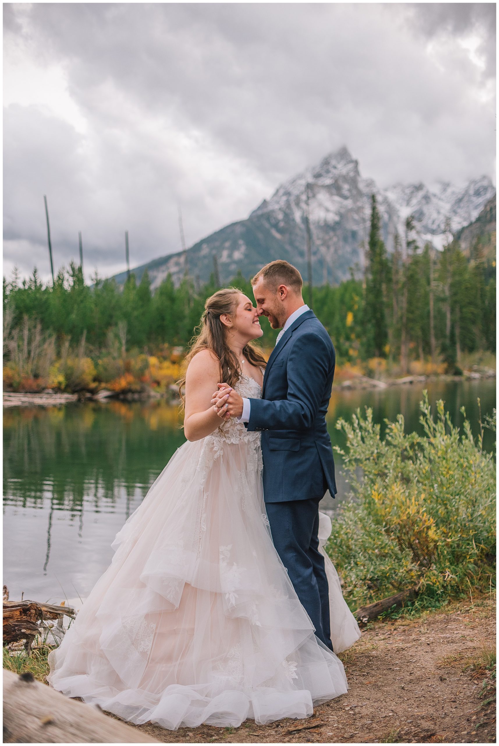bride and groom dancing as husband and wife after cabin elopement