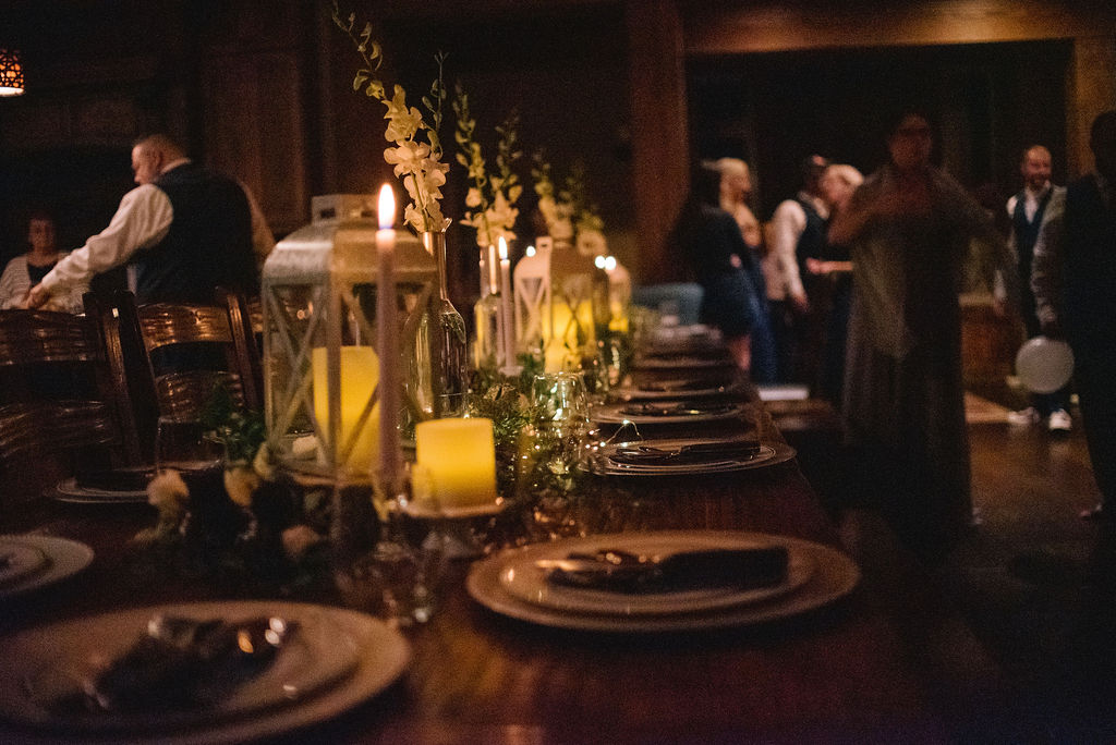 The Stand in Knoxville with dim lights and gorgeous place settings for a wedding reception. 
