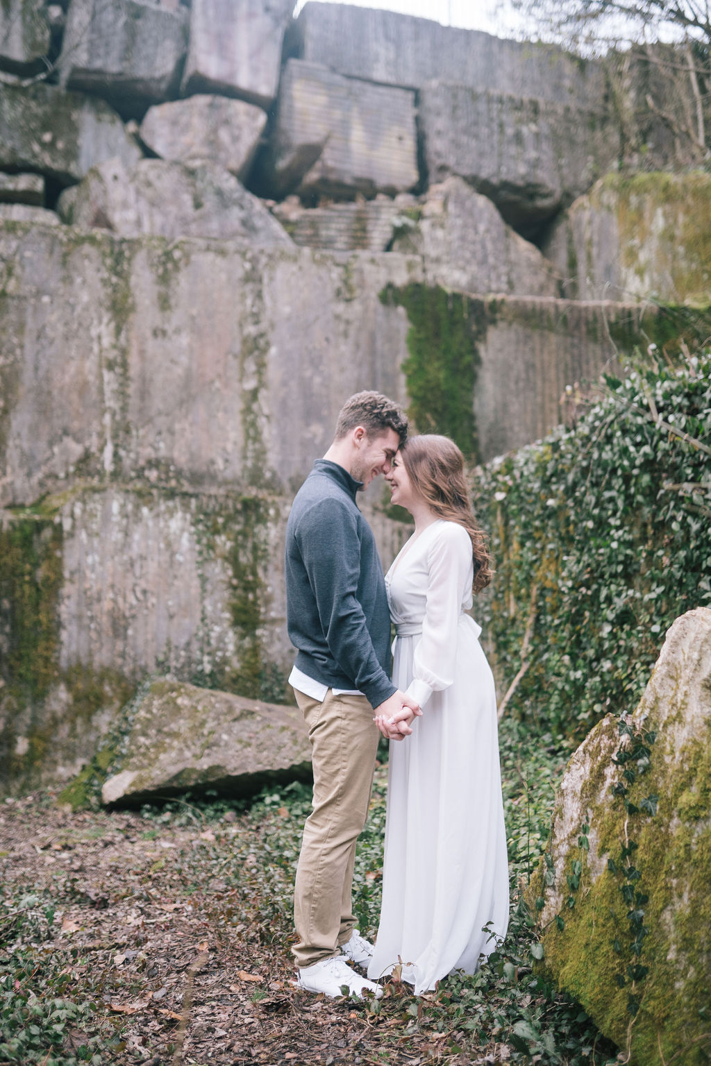 engaged couple exploring meads quarry during outdoor engagement session