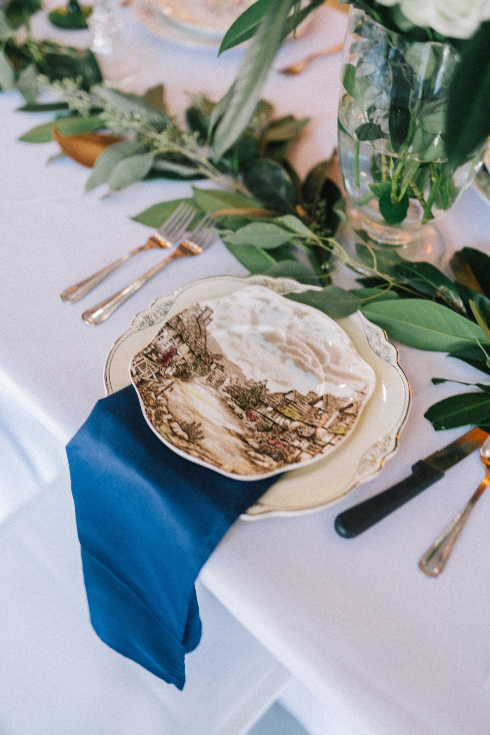 place setting with vintage fine china for a wedding in the south