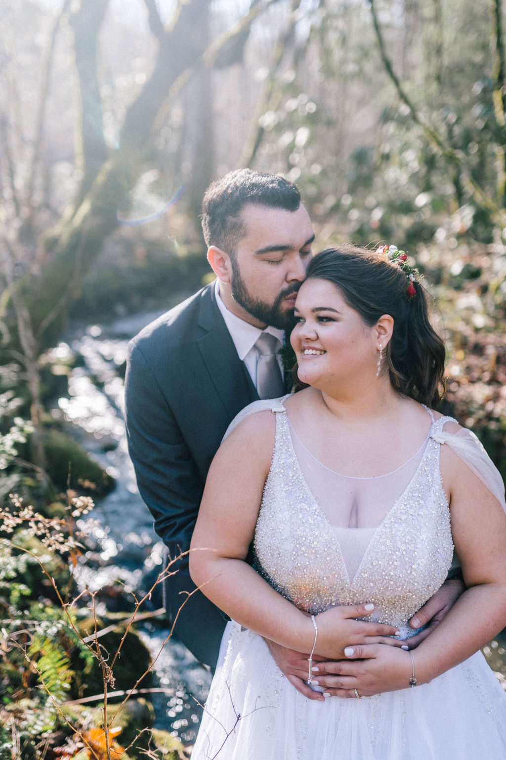 tennessee wedding day couple in the woods standing on a stream