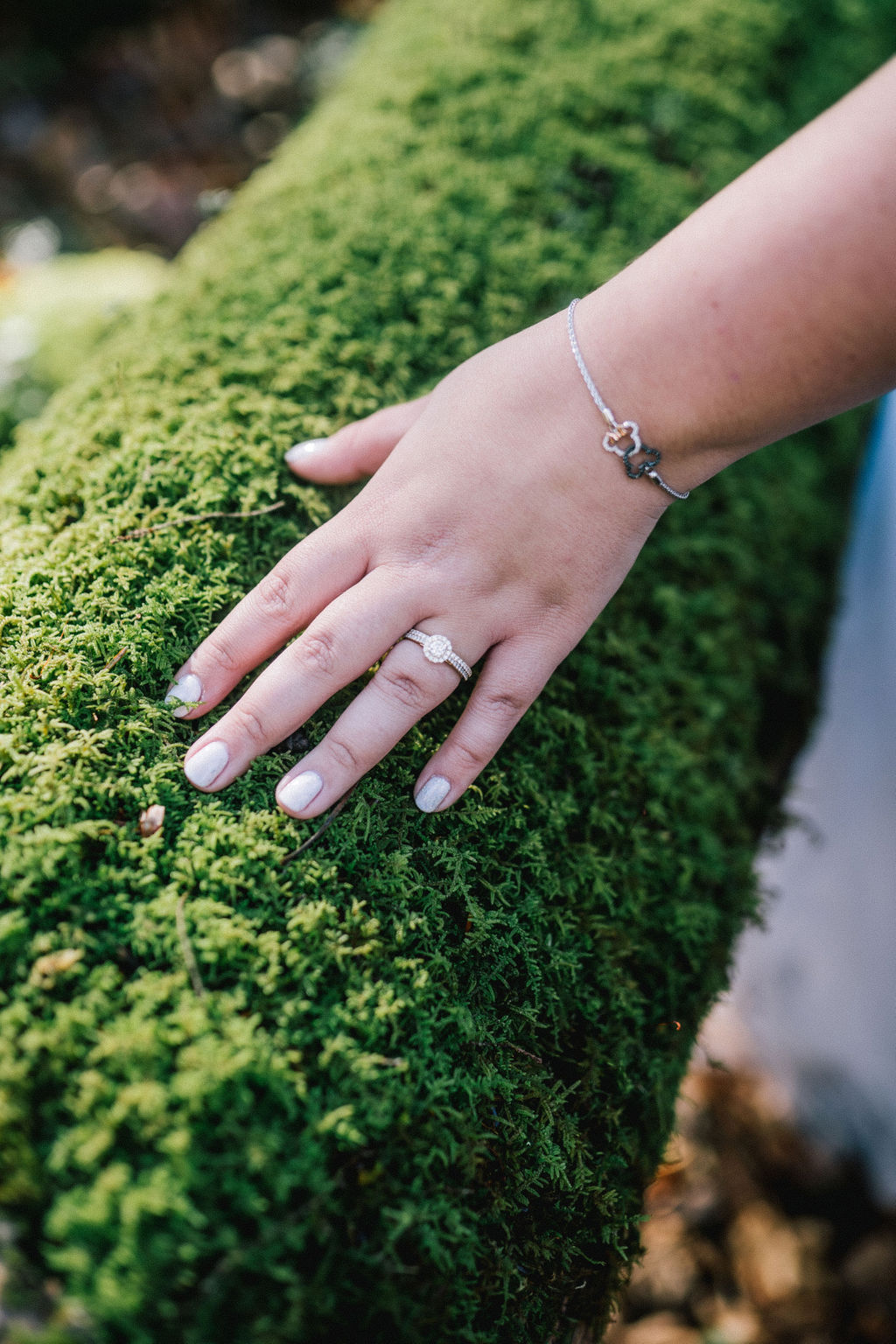 detail shot of a brides ring on the moss in the woods. smoky mountain elopement photographer