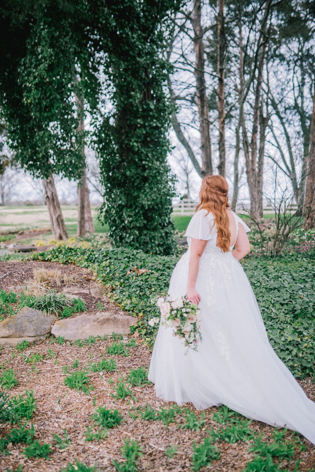 bride walking through a whimsical fairytale forest