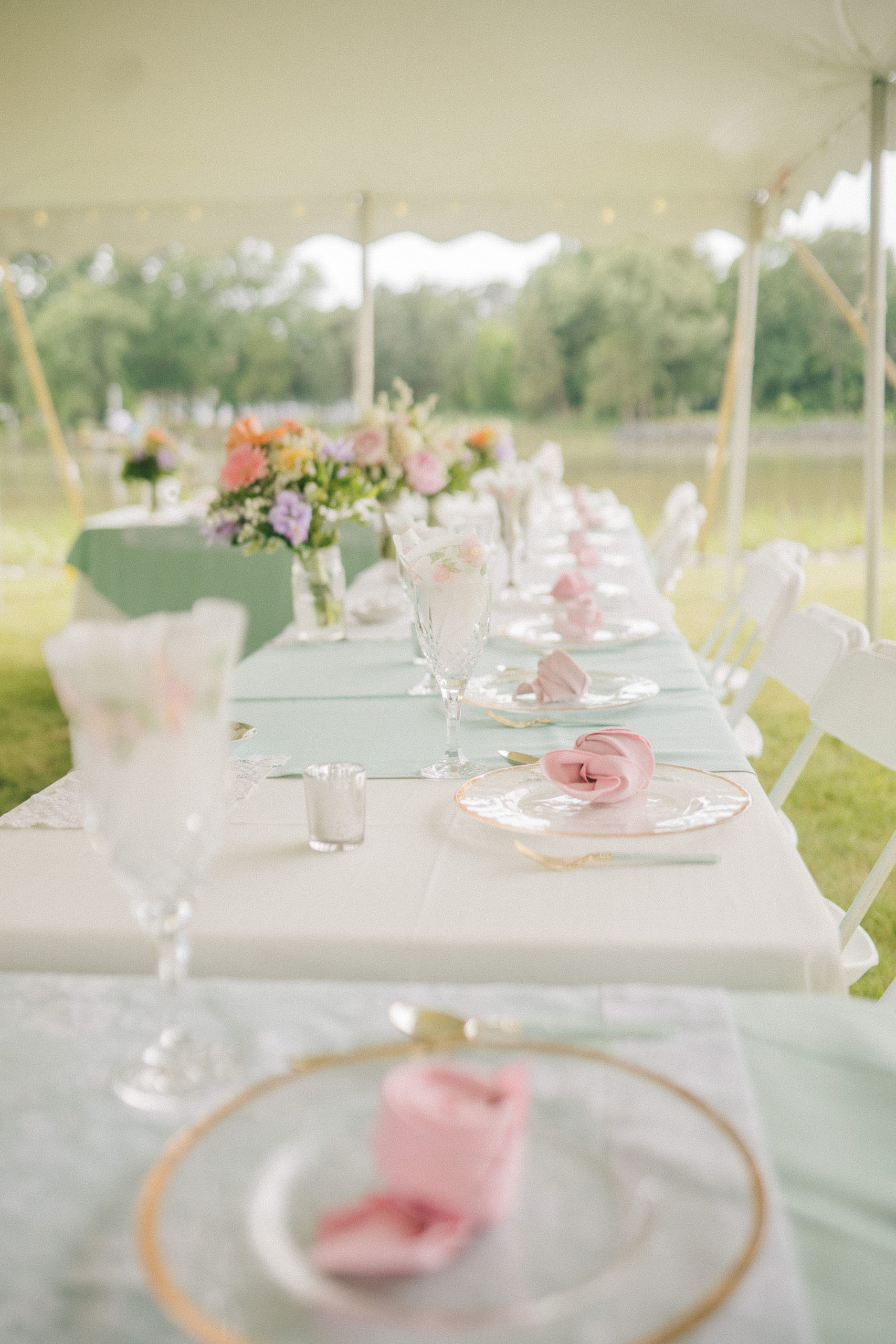 elegant table setting for wedding day in Maryland destiantion wedding with pink, mint green and florals details