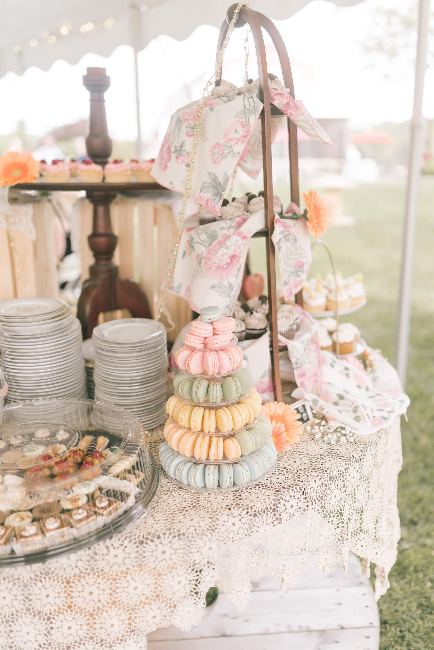 elegant and whimsical dessert table at a Maryland destination wedding with pastel colors and delightful sweets