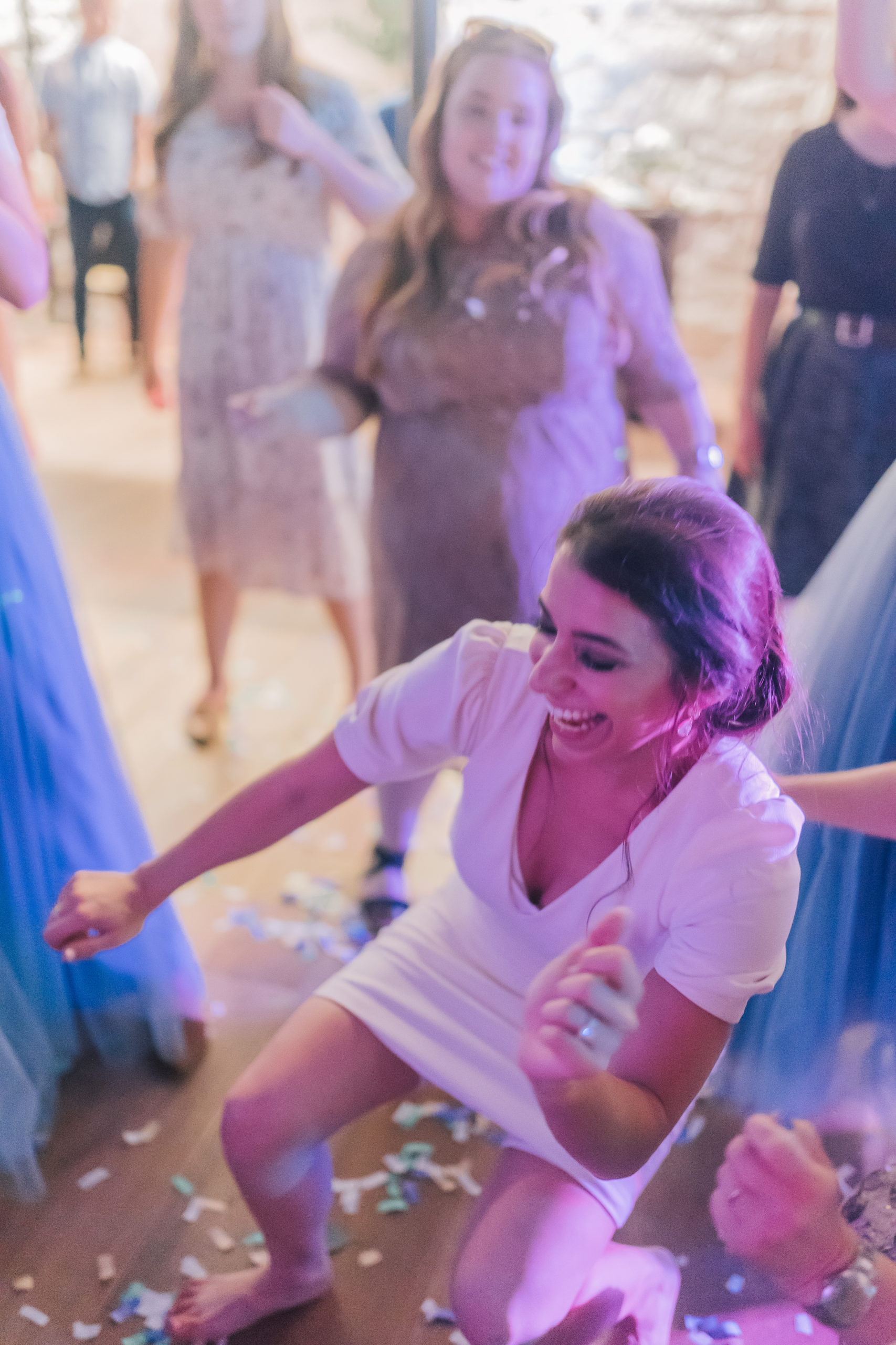 Amalfi Coast Themed Wedding bride dancing at her wedding reception with her bridesmaids and friends